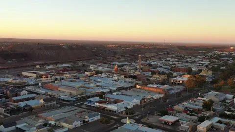 Down to local downtown street in Broken Hill city at sunrise – 4k flying. Stock Footage 168151718