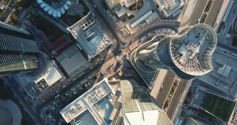 Down-looking aerial view of a global city, with  towers and big avenues, Qatar 動画素材 132096566