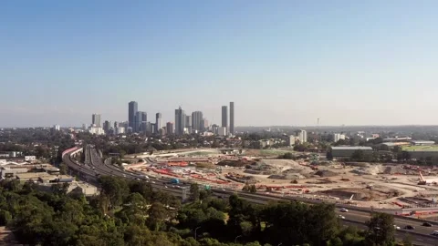 Down at M4 motorway in view of Parramatta CBD skyline – urban aerial 4k view. Stock-Footage 309338880