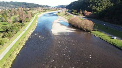 Down a River With a Highway and a Golf Course 스톡 동영상 255865889