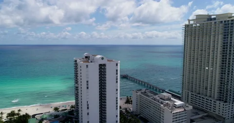 Down the Sunny Isles shore Stock Footage 149717368