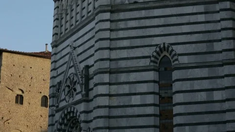 Down-up tilting shot of the octagonal shaped San Giovanni in Corte baptistery in Stock-Footage 100601681