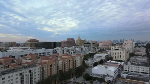 Down town Coral Gables - Miracle Mile at dusk.  Airplane flyover Stock Footage 146406922