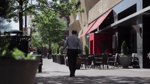Down Town Street Man Walking Slow Pan Stock Footage 84274405