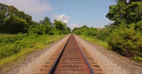 Down train tracks along the Hudson River in New York Stock Footage 346374713