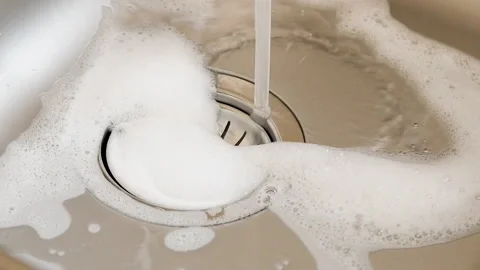 A down view of a kitchen sink drain. Video stock 90887936