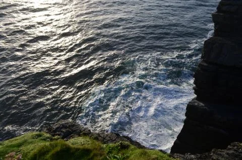 Down View to the Sea from Cliffs of Loop Head Peninsula in Clare, Ireland Stock Photos
