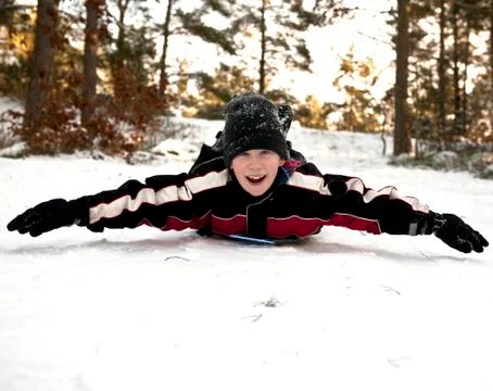 Downhill on belly Stock Photos