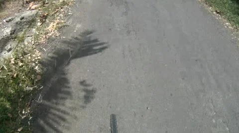 Downhill on a bicycle, point of view Stock Footage 10868152