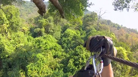 Downhill cable car. Grabbing on to the rope with great speed flying through the  Stock Footage 64013780