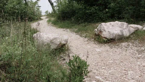 Downhill Cyclist Biker Rides Down A Gravel Slope Stock Footage 93660253