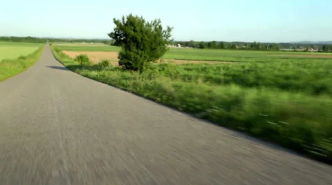 Downhill driving on an empty asphalt road HD 24 fps Stock Footage 49966666