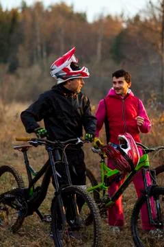 Downhill mountain bikers Stock Photos
