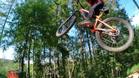 Downhill mountain biking Slowmo Stock Footage 167867987