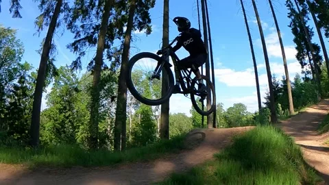 Downhill mountain biking Slowmo Stock Footage 167867996
