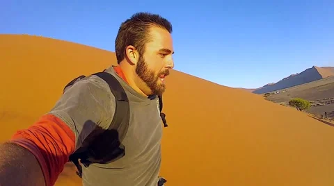 Downhill run on the largest sand dune in the world (Namibia, Africa). Stock Footage 43966450