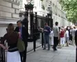 Downing Street Zoom in to Gates opening, London England GFSD SD Footage