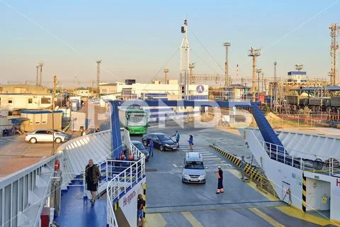 Download car ferry on the ferry crossing to the Crimea at sunset Stock Photos