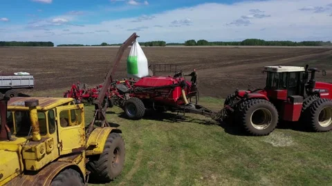 Download grain from bag into sowing complex Stock Footage 130521400