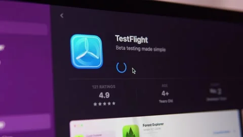 Downloading and installing TestFlight from the App Store on your MacBook. Stock Footage 202802233