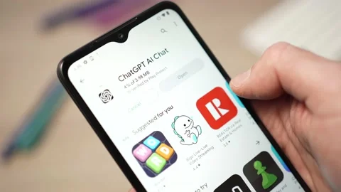 Downloading ChatGPT Chat Bot App from Open AI on Smartphone Video stock 229677115