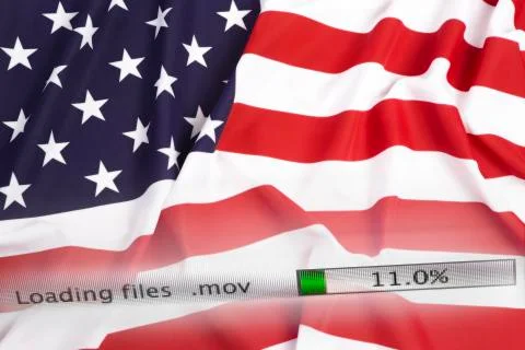 Downloading files on a computer, US flag Stock Photos