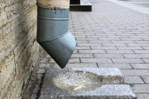 Downpipe asphalt road Stock Photos