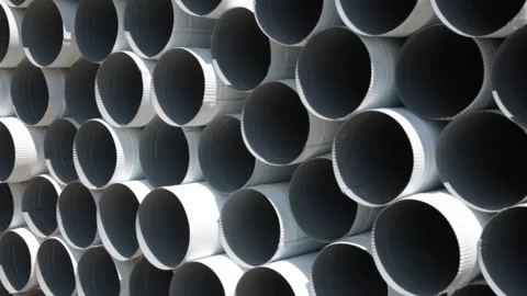 Downpipe warehouse. Stack of stainless steel pipes. Stock Footage 155683592