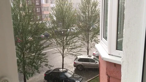 The downpour began. It's raining. View from the street and rain. 스톡 동영상 88030169