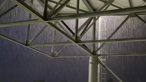 Downpour - Metal Structure Under Heavy Rain Shower Video stock 311576925
