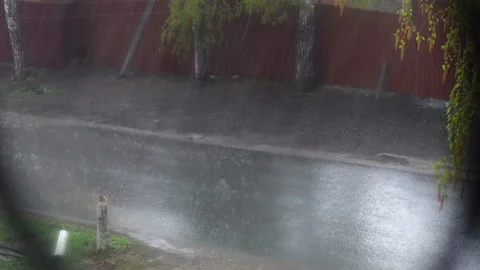 The downpour outside. Street view from the window Stock Footage 107319191