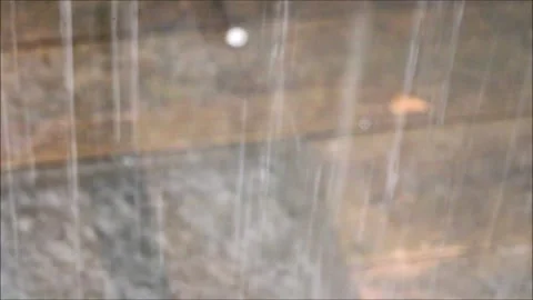 Downpour of Rain in Front of Wood Deck Stock Footage 202598780
