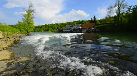 Downstream view of the small waterfall on the Dobra River, Croatia Stock Footage 62956975
