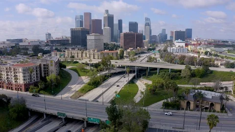 Downtown Aerial view of light freeway traffic in Los Angeles Video stock 128223266