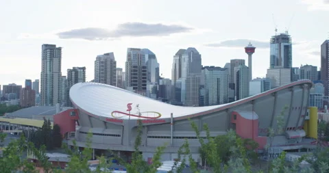 Downtown Calgary Alberta Canada wide pan of Saddledome Stock Footage 137543457