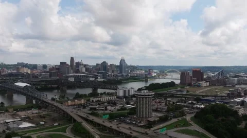 Downtown Cincinnati skyline, Ohio River and highway network, aerial Stock Footage 345231557