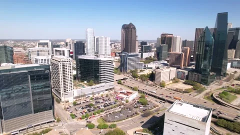 Downtown Dallas Skyline and Freeway, 4K Aerial Pan Stock Footage 196010991