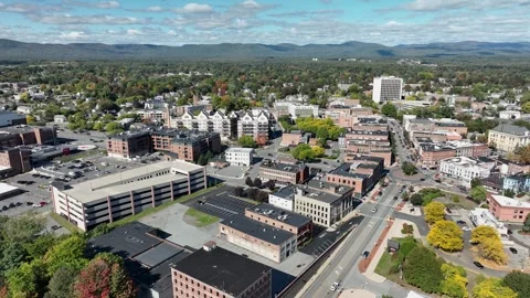 Downtown Glens Falls streets and rooftops aerial, New York Stock Footage 347004097