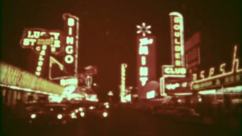 Downtown Las Vegas at night with neon lights 1950s family home movie 6069 Stock Footage
