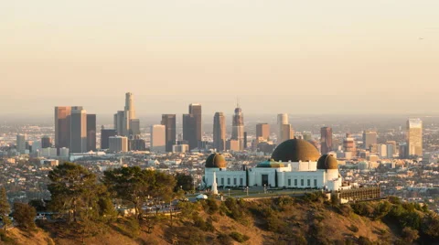 Downtown Los Angeles and Griffith Observatory - Day To Night Timelapse Stock Footage
