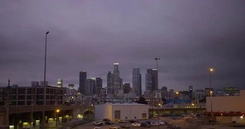 Downtown Los Angeles with dramatic clouds during sunset time. Stock Footage 73332897