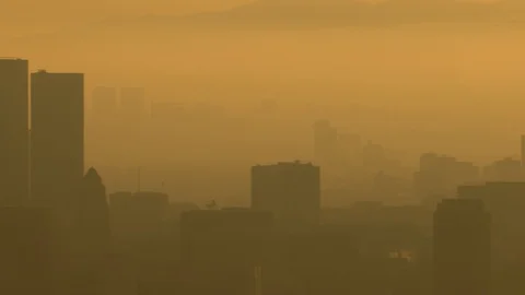 Downtown Los Angeles skyline in foggy morning sunlight Stock Footage