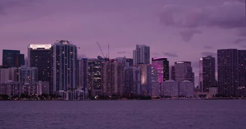Downtown Miami from  Key Biscayne  close-up lockoffs purple haze sunset Stock Footage 241601975