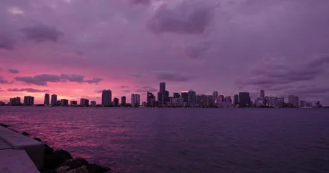 Downtown Miami from  Key Biscayne  extreme wide purple haze sunset Stock Footage 241601790