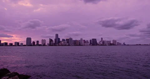 Downtown Miami from  Key Biscayne  extreme wide sunsetpurple haze lockoff 2 Stock Footage 241603146