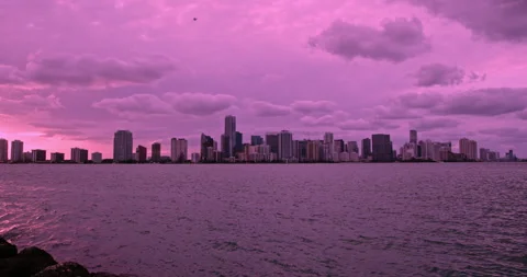 Downtown Miami from  Key Biscayne  sunset  purple haze  look  lock offs Stock Footage 241603291