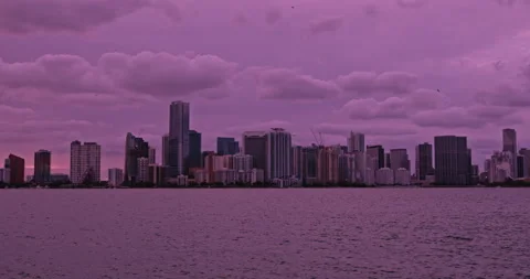 Downtown Miami from  Key Biscayne  sunset  purple haze  look Stock Footage 241610212