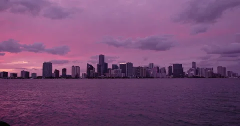 Downtown Miami from  Key Biscayne  wide sunset purple haze 2 Stock Footage 241610728