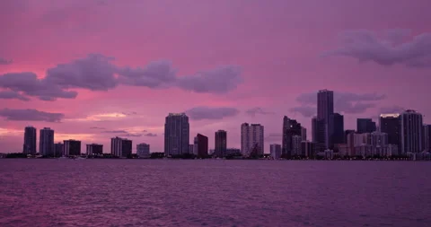 Downtown Miami from  Key Biscayne  wide sunset purple haze 3 Stock Footage 241611142