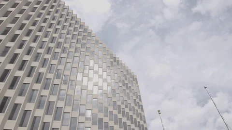 Downtown Midland sky scraper, panning shot, on a cloudy day Video stock 88155100